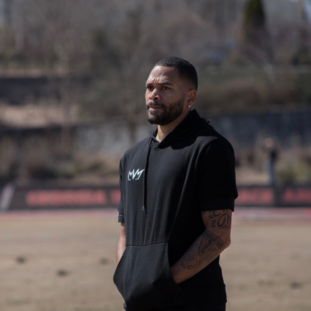 Athlete Devon Williams wearing the MVM Short Sleeve Hoodie