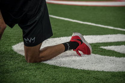 Athlete wearing the black MVM Training Crew Socks